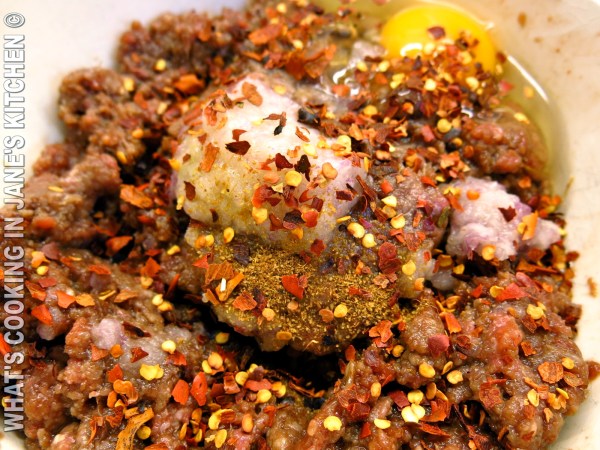 Spicy Burgers On The Grill ©