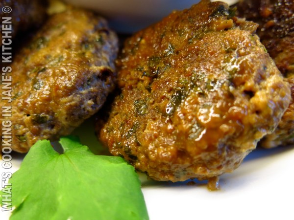 Spicy Burgers On The Grill ©