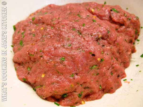 Spicy Burgers On The Grill ©