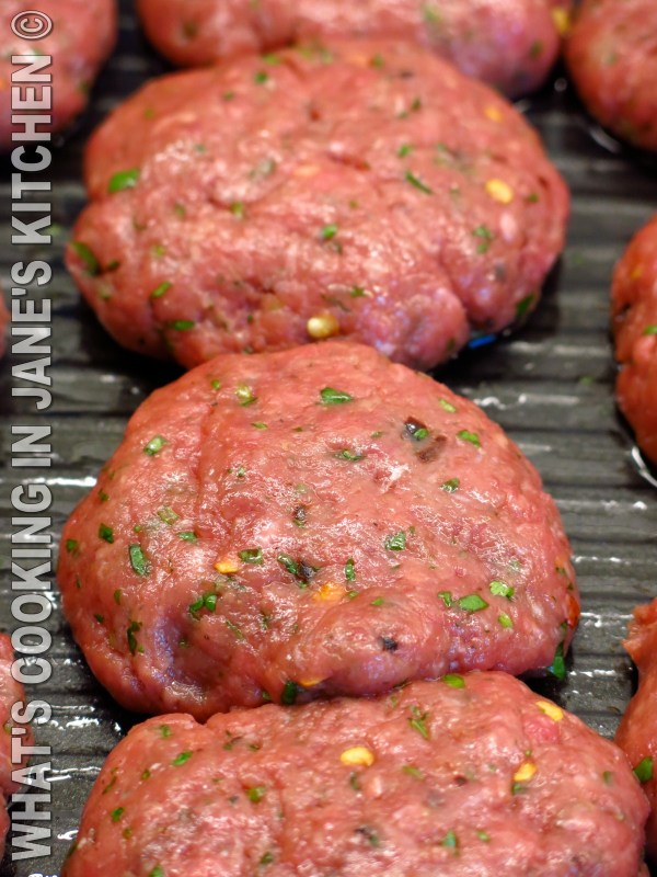 Spicy Burgers On The Grill ©